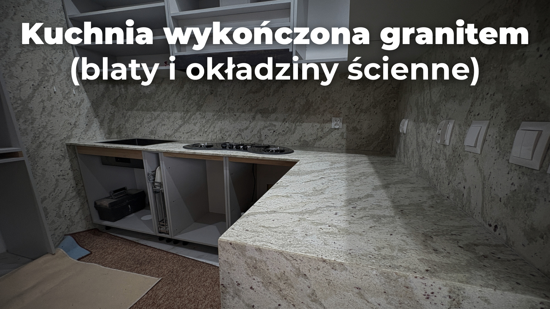 Kuchnia wykończona blatami i okładzinami ściennymi z granitu